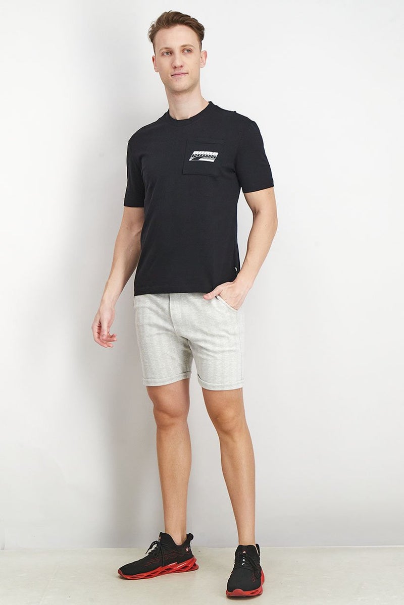 PUMA Men Sportswear Fit Crew Neck Short Sleeve Graphic Pocket T Shirt, Black - Image 2